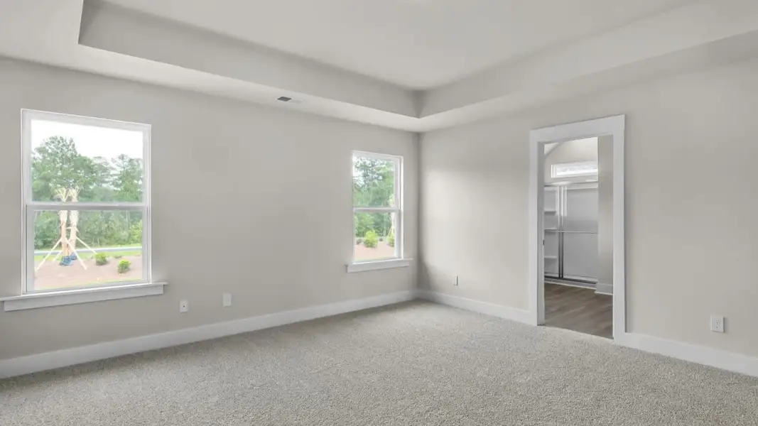 Representative unfurnished interior of a home built from the Forrester by D.R. Horton in The Highlands at Cedar Hill Landing, Navassa (Image 26).