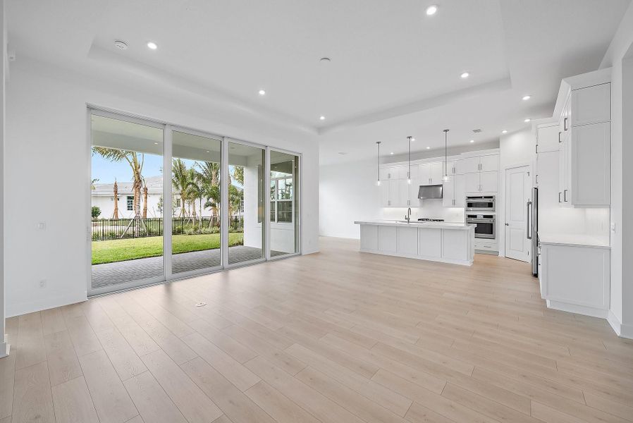 Spacious, unfurnished interior of a new home in L'Ambiance at Avenir, Palm Beach Gardens (Image 42).