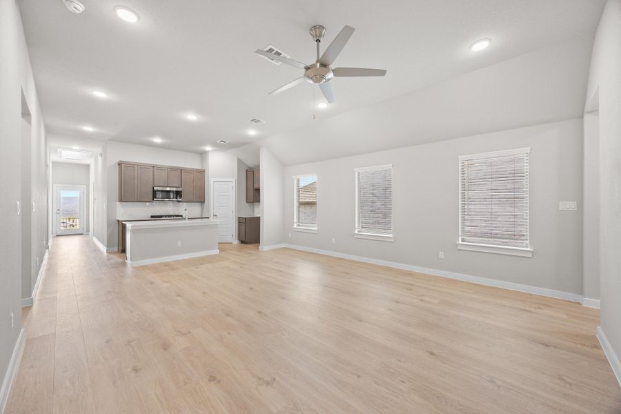 Living and Dining Area in the Cypress home plan by Trophy Signature Homes - REPRESENTATIVE PHOTO Living and Dining Area in the Cypress home plan by Trophy Signature Homes - REPRESENTATIVE PHOTO