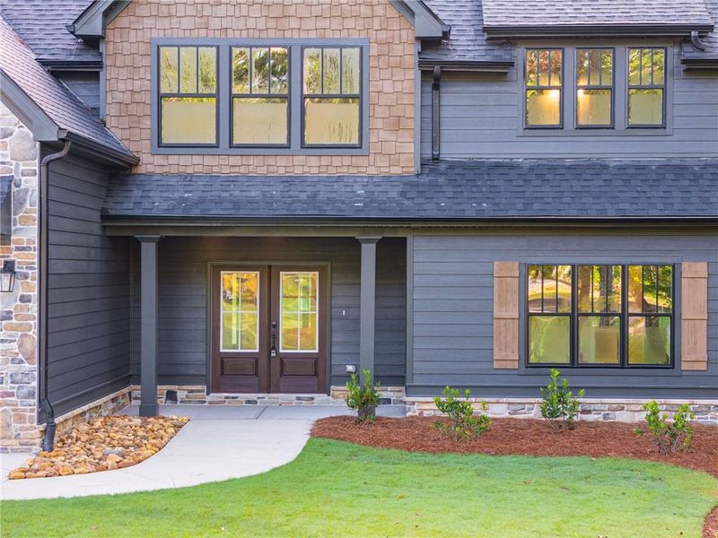 Front exterior of a new home in Liberty Station, Bremen, GA, highlighting curb appeal (Image 25).