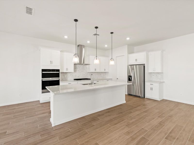 Furnished interior view inside a new home in White Tank Foothills Signature Series, Waddell (Image 3).