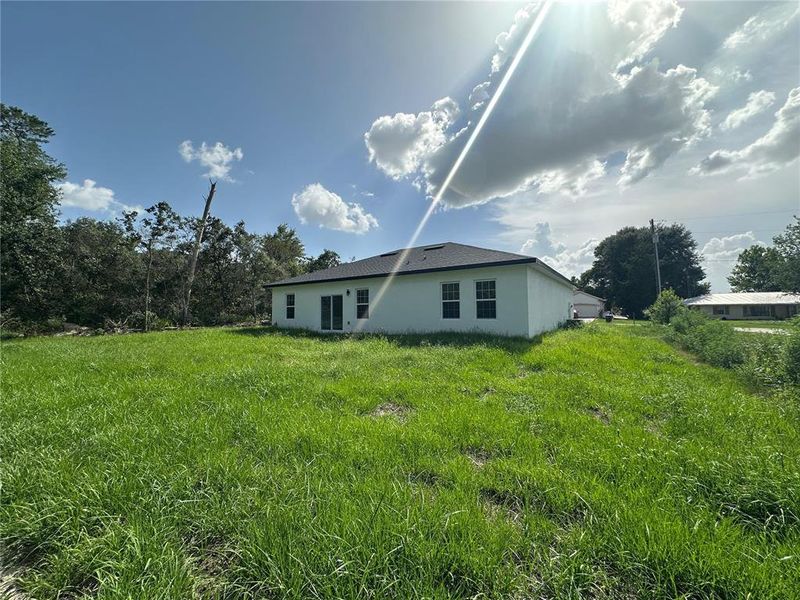 Exterior details and patio area of a home in , Ocala (Image 4).