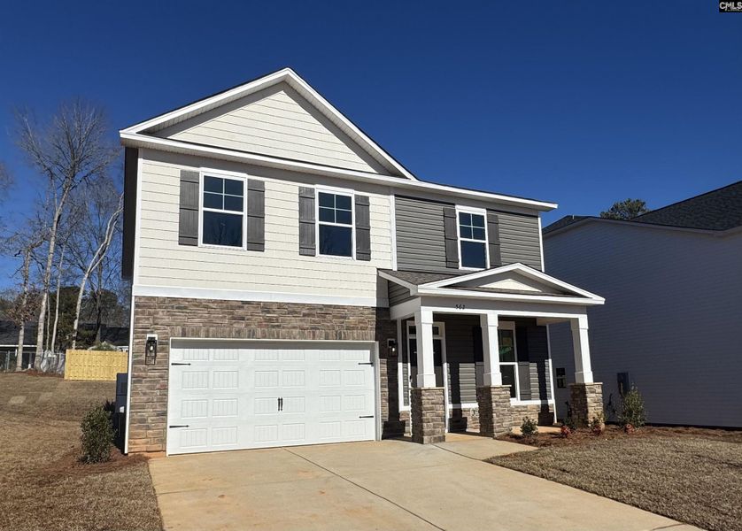 Front exterior of a new home in Boykin Hills, Chapin, SC, highlighting curb appeal (Image 2). Front exterior of a new home in Boykin Hills, Chapin, SC, highlighting curb appeal (Image 2).