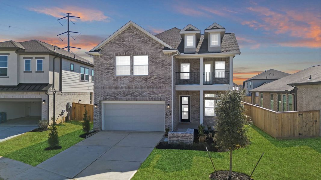 Front exterior of a new home in Bridgeland, Cypress, TX, highlighting curb appeal (Image 20). Front exterior of a new home in Bridgeland, Cypress, TX, highlighting curb appeal (Image 20).
