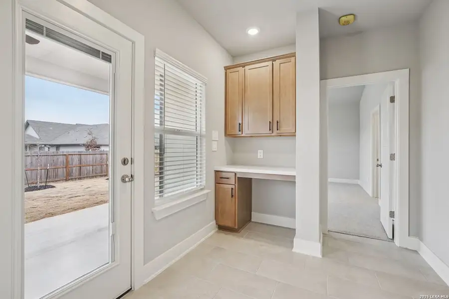 Furnished interior view inside a new home in Estancia Ranch - Premier Series, San Antonio (Image 19).