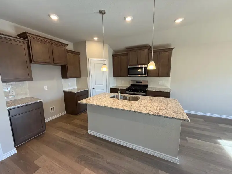 Furnished interior view inside a new home in Southern Pointe, College Station (Image 4).