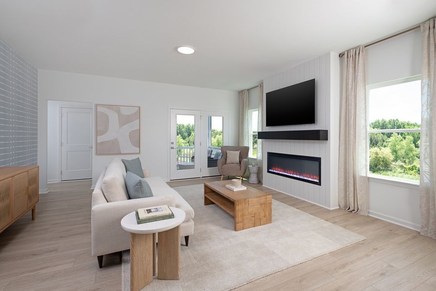 Furnished interior in a model home at Preserve at The Point in Rolesville (Image 9).