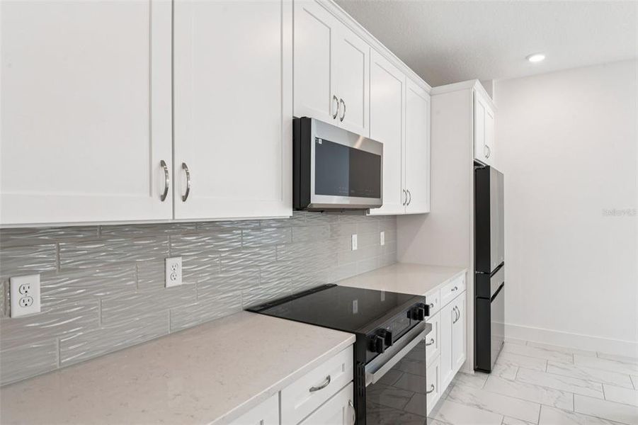 Furnished interior view inside a new home in Lagoon Residences at Epperson, Wesley Chapel (Image 9).