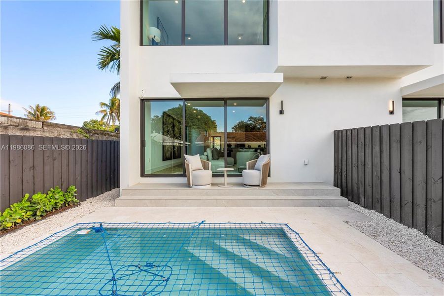 Exterior details and patio area of a home in , Miami (Image 29). Exterior details and patio area of a home in , Miami (Image 29).