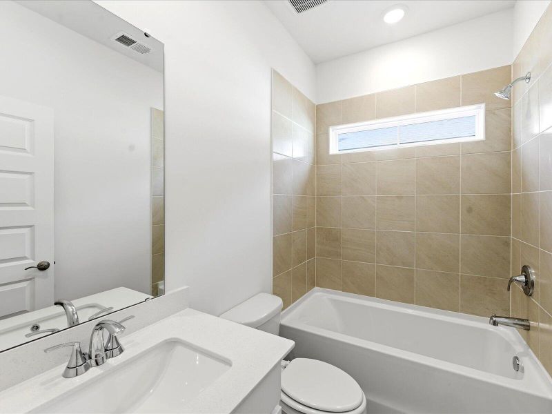 Furnished interior view inside a new home in The Coves at Lakes of Cane Bay II, Summerville (Image 14).