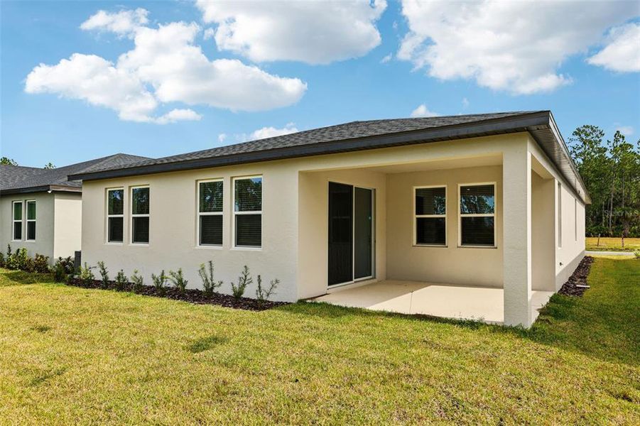 Exterior details and patio area of a home in Ridgehaven - Signature Series, Ormond Beach (Image 23).