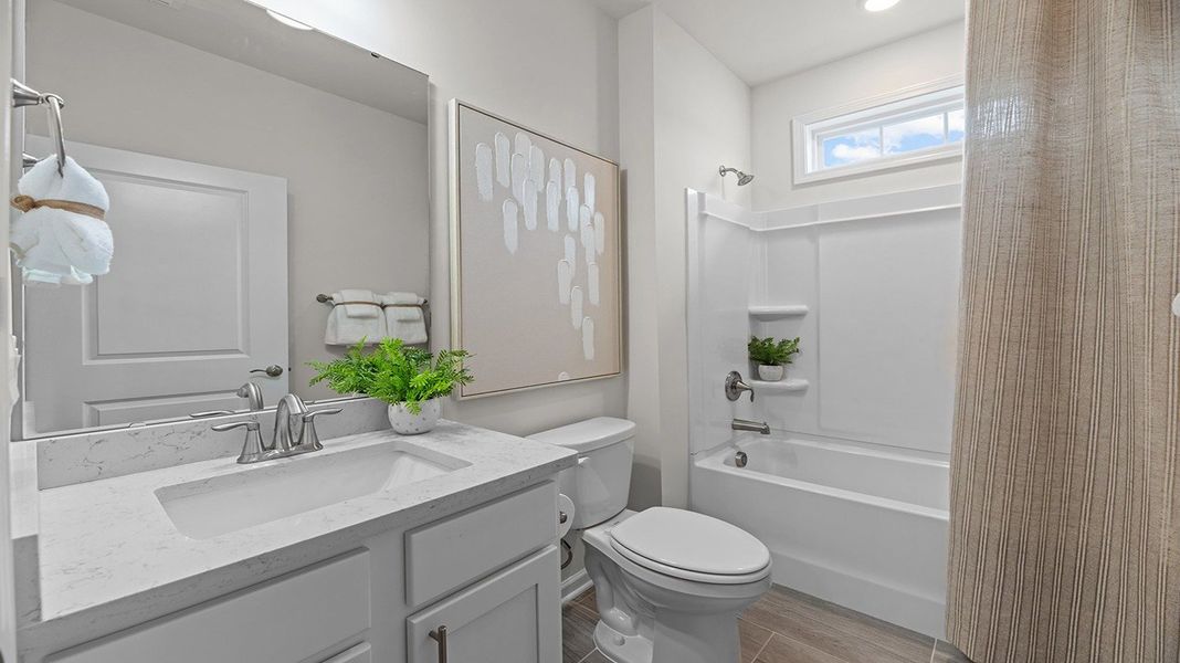 Representative furnished interior of a home built from the Clifton by D.R. Horton in Quarry Hills - Freedom, Swepsonville (Image 7).