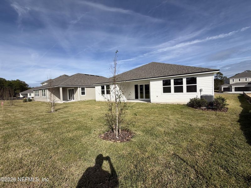 Exterior details and patio area of a home in The Cypress Series at Reserve East, Flagler Beach (Image 19).