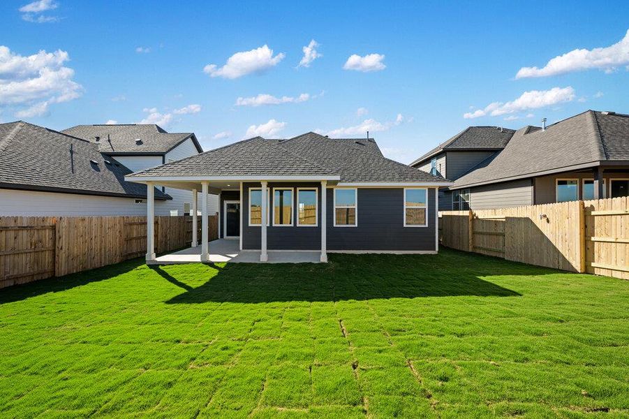 Exterior details and patio area of a home in Patterson Ranch, Georgetown (Image 23).