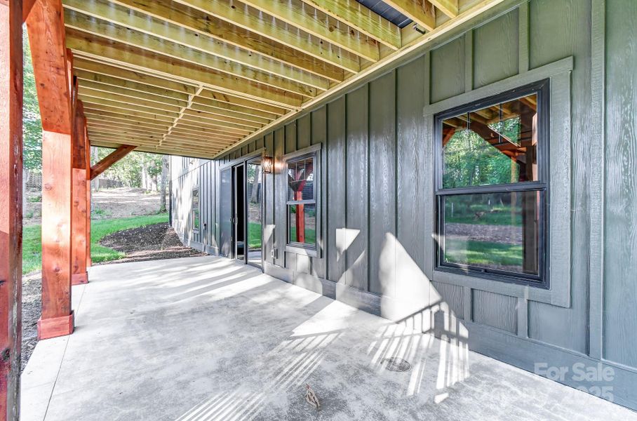 Exterior details and patio area of a home in , Mills River (Image 22).