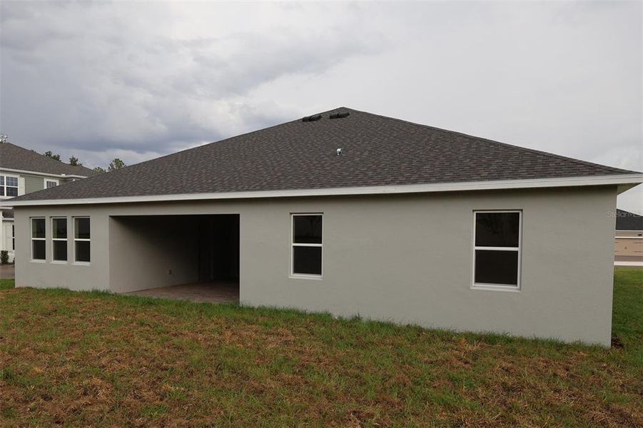 Exterior details and patio area of a home in Wolf Lake Ranch, Apopka (Image 3).