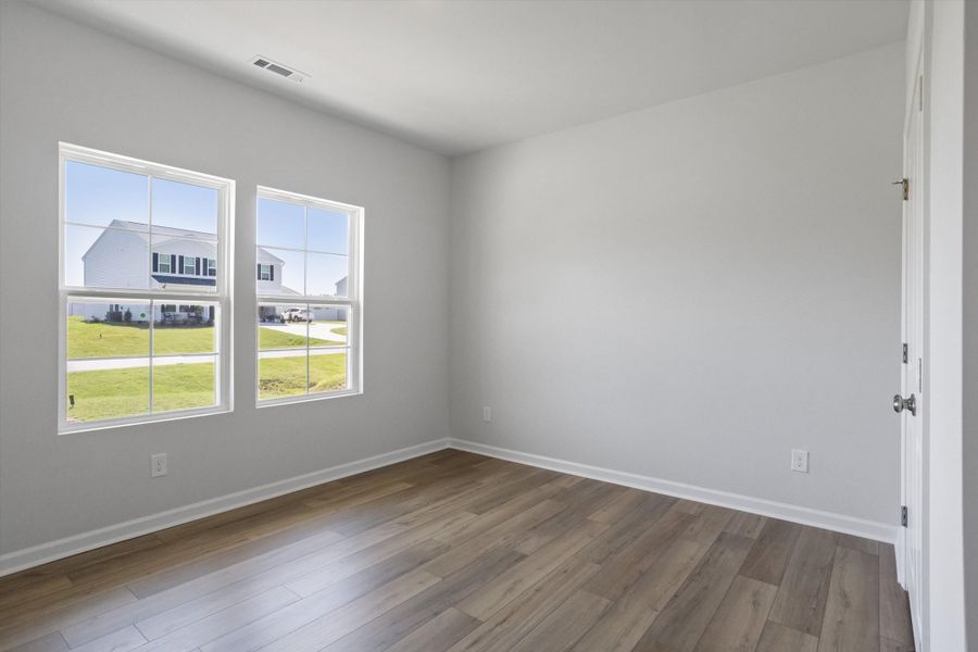 Spacious, unfurnished interior of a new home in Cambridge Reserve, Angier (Image 18).