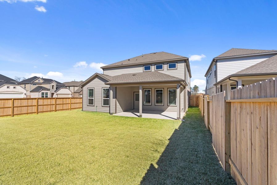 Exterior details and patio area of a home in Barton Creek Ranch, Conroe (Image 18). Exterior details and patio area of a home in Barton Creek Ranch, Conroe (Image 18).
