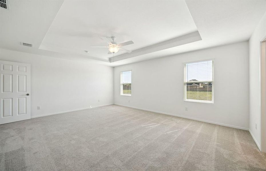 Spacious owner's suite with private bath