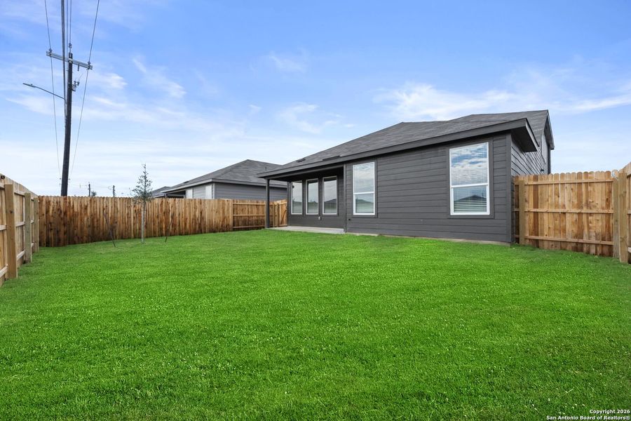 Exterior details and patio area of a home in Voss Farms, New Braunfels (Image 3).