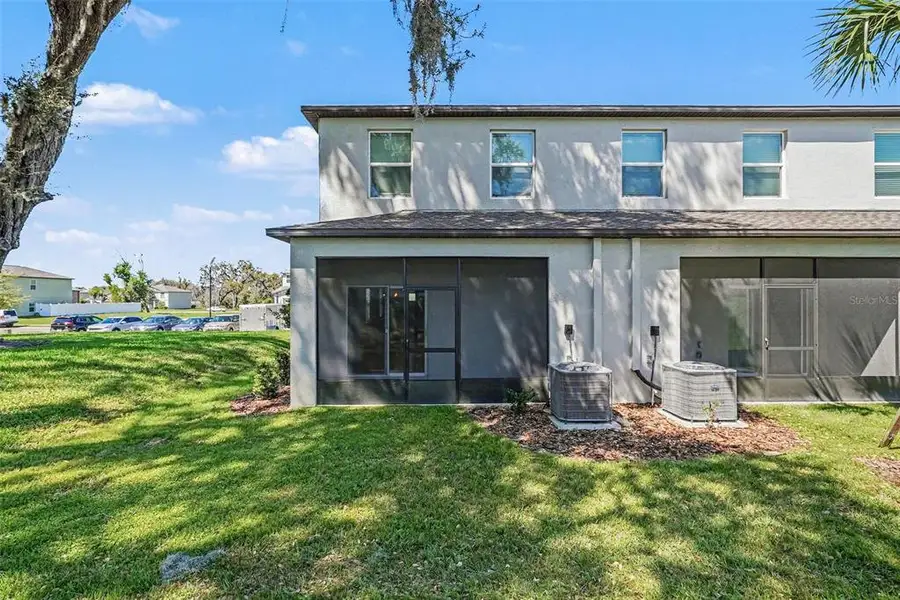 Exterior details and patio area of a home in , Zephyrhills (Image 4).