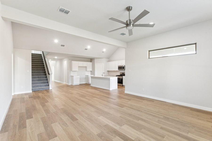 Open First Floor in the Wimbledon home plan by Trophy Signature Homes – REPRESENTATIVE PHOTO Open First Floor in the Wimbledon home plan by Trophy Signature Homes – REPRESENTATIVE PHOTO