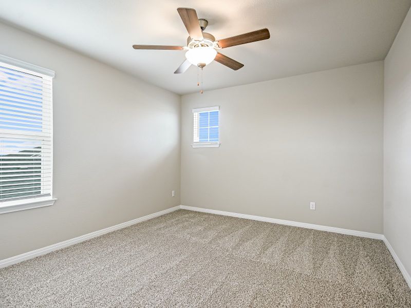 Spacious, unfurnished interior of a new home in Butler Farms - Boulevard Collection, Liberty Hill (Image 11).