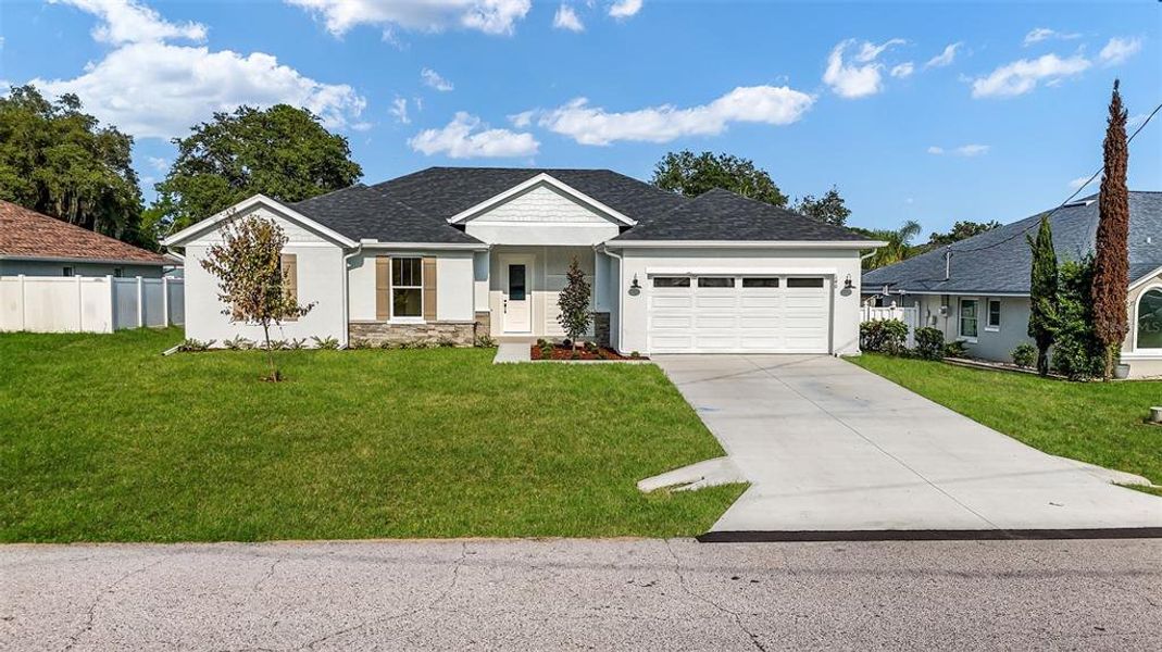 Front exterior of a new home in , Palm Coast, FL, highlighting curb appeal (Image 31).