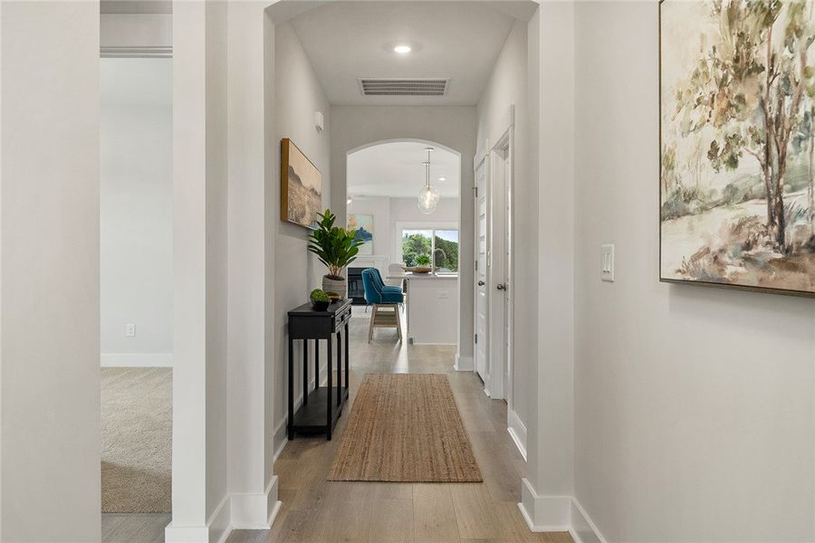 A well-lit corridor welcomes you home, flowing sea A well-lit corridor welcomes you home, flowing sea