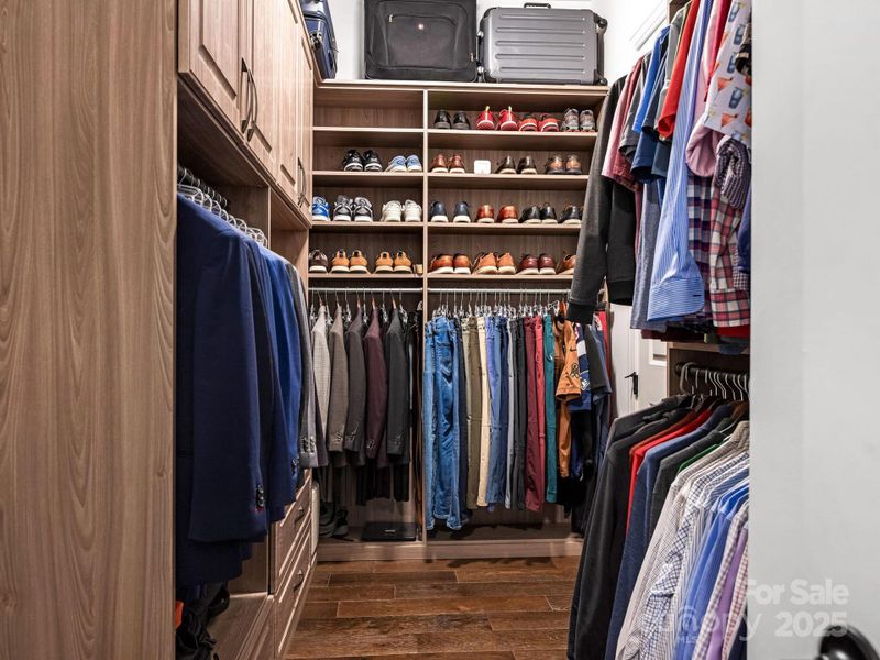 1st Flr, second custom closet system that leads to laundry room.