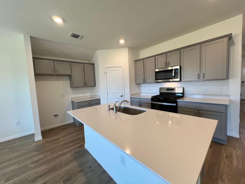 Furnished interior view inside a new home in Rosenbusch Ranch, Leander (Image 6). Furnished interior view inside a new home in Rosenbusch Ranch, Leander (Image 6).