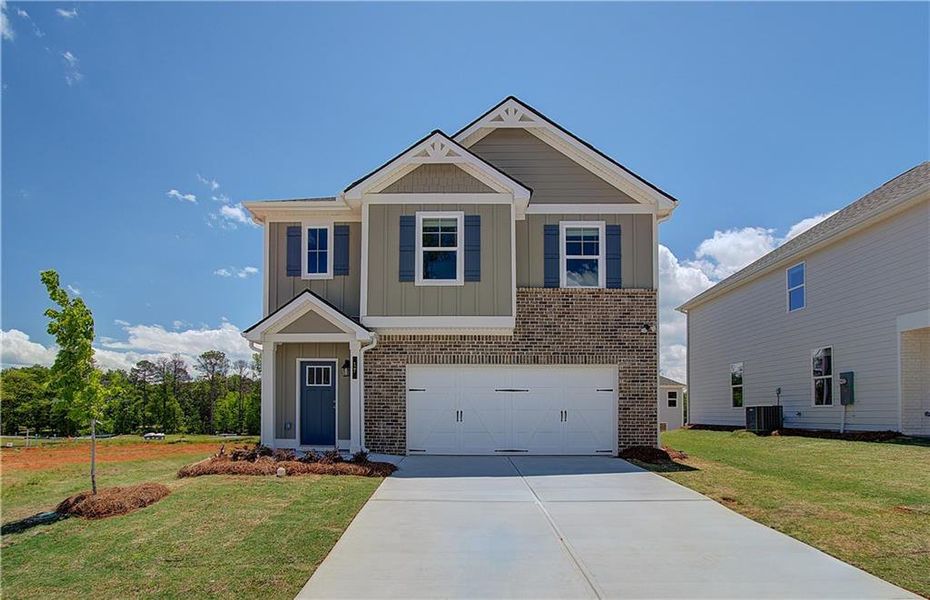 Front exterior of a home in the Enclave at Evergreen community, located in Fairburn, GA (Image 11). Front exterior of a home in the Enclave at Evergreen community, located in Fairburn, GA (Image 11).