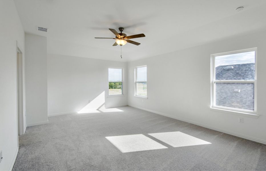 Spacious owner's suite with private bath