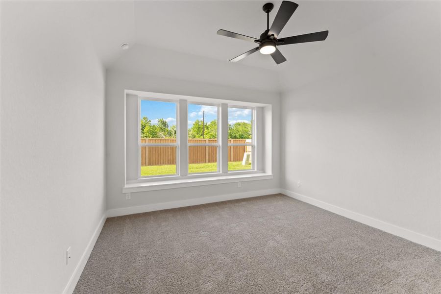 Spacious, unfurnished interior of a new home in Ellwood, Iowa Colony (Image 13).