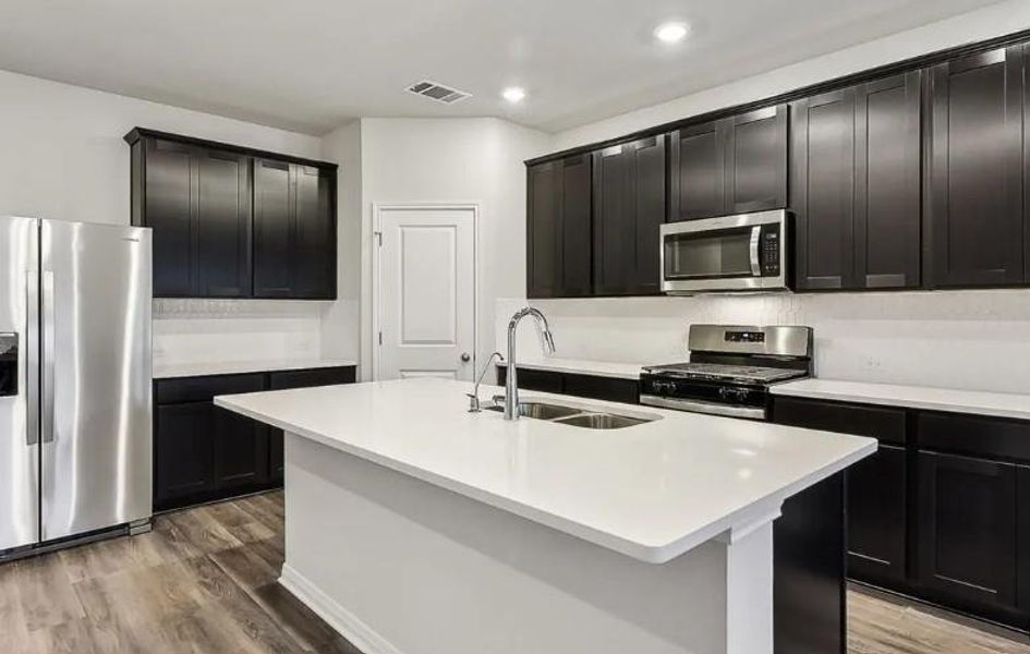 Photo is not of the actual home, but is an inspirational photo of builder’s model home and may depict options, furnishings, and/or decorator features that are not included