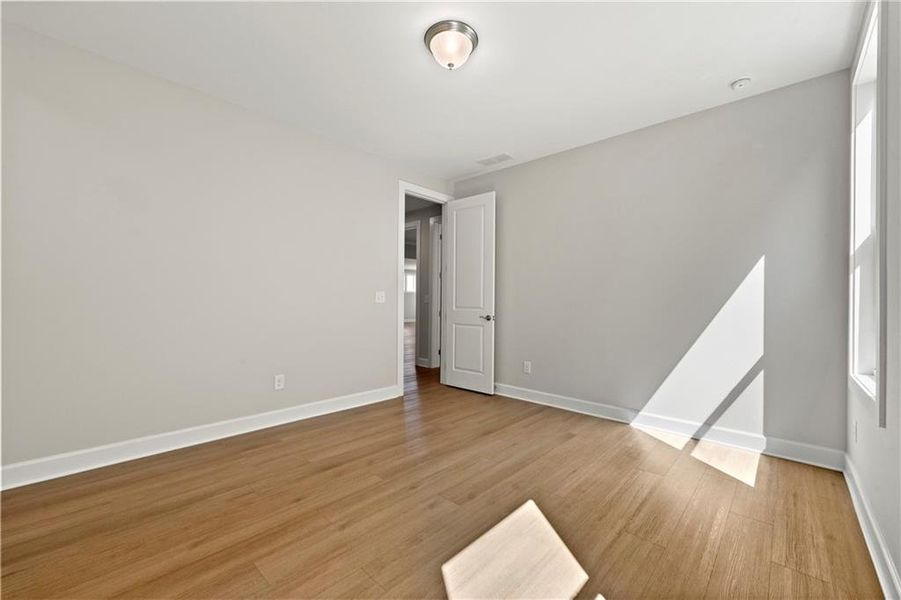 Spacious, unfurnished interior of a new home in Cresswind Georgia at Twin Lakes, Hoschton (Image 27).