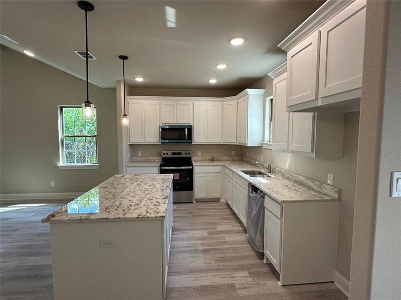 Furnished interior view inside a new home in , Garland (Image 6).