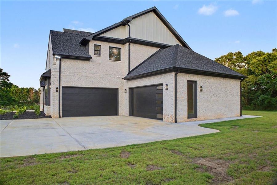 Front exterior of a new home in , Monroe, GA, highlighting curb appeal (Image 2). Front exterior of a new home in , Monroe, GA, highlighting curb appeal (Image 2).