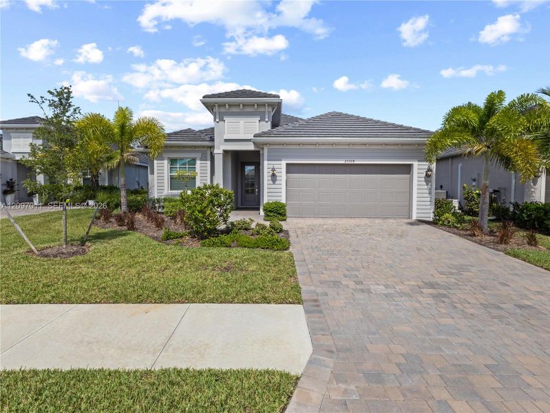 Front exterior of a new home in , Punta Gorda, FL, highlighting curb appeal (Image 23).