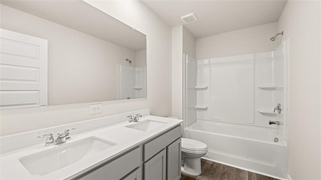 Furnished interior view inside a new home in Preserve at Dove Creek, Statham (Image 11).