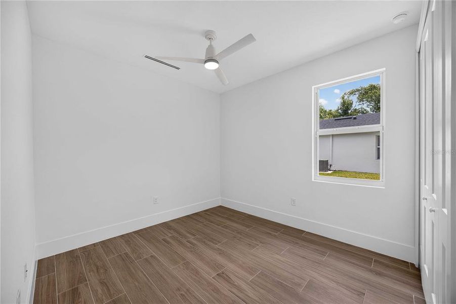 Spacious, unfurnished interior of a new home in , Port Charlotte (Image 41).