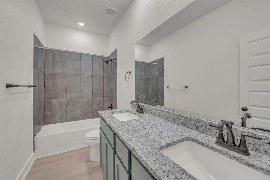 Please Note: These interior photos are not of the actual home but are of a completed one with a similar floor plan. Finishes, features, and layouts may vary.