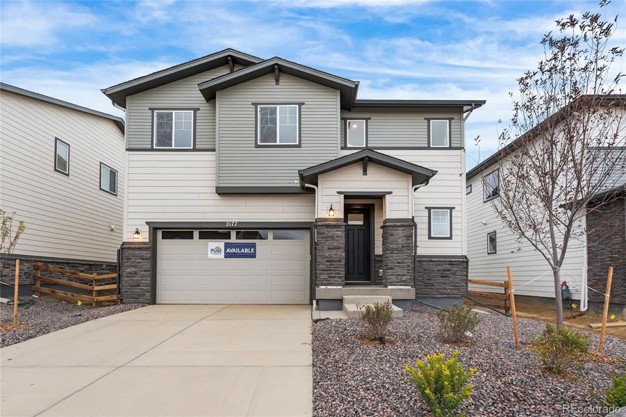 Front exterior of a home in the Harvest Crossing community, located in Aurora, CO (Image 14).