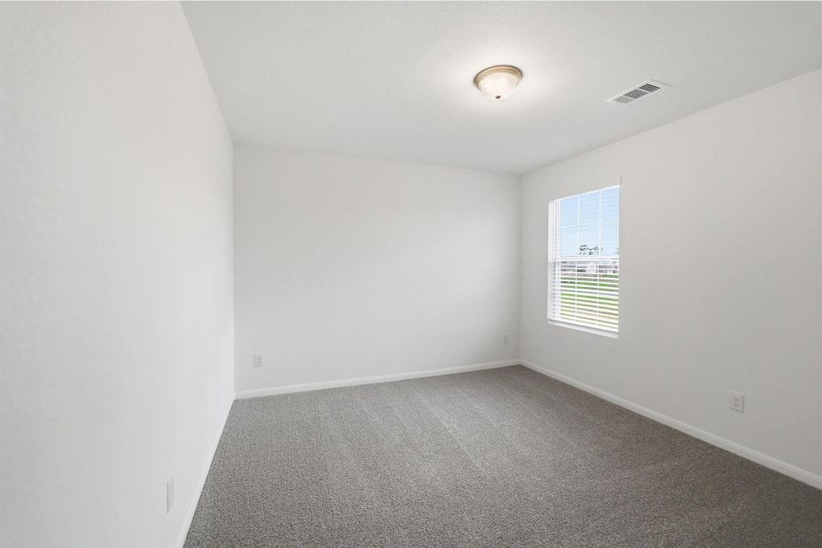 Spacious, unfurnished interior of a new home in The Canopies, Splendora (Image 20).