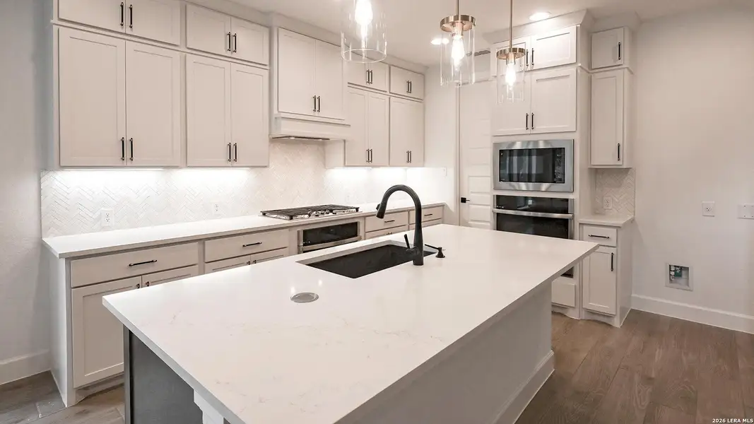 Furnished interior view inside a new home in Hidden Canyon, San Antonio (Image 8).