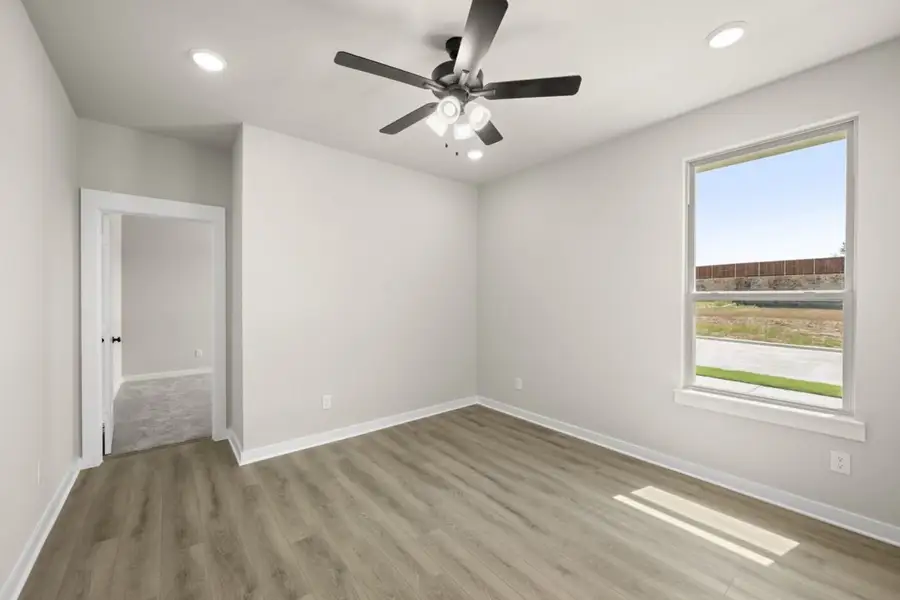 Representative unfurnished interior of a home built from the Hunters Crossing Rowan 2104 by Brohn Homes in Hunters Crossing, Sealy (Image 29).