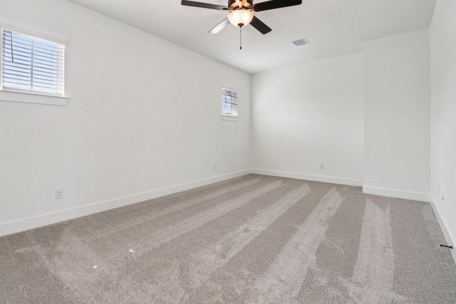 Spacious, unfurnished interior of a new home in The Highlands, Porter (Image 27).