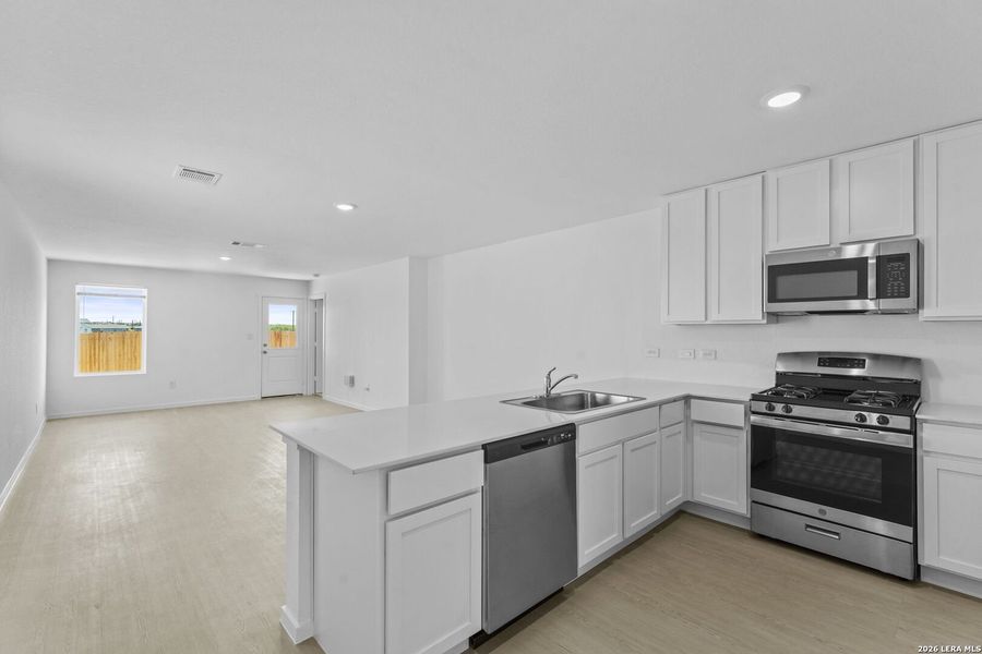 Furnished interior view inside a new home in Spring Grove, St. Hedwig (Image 12).