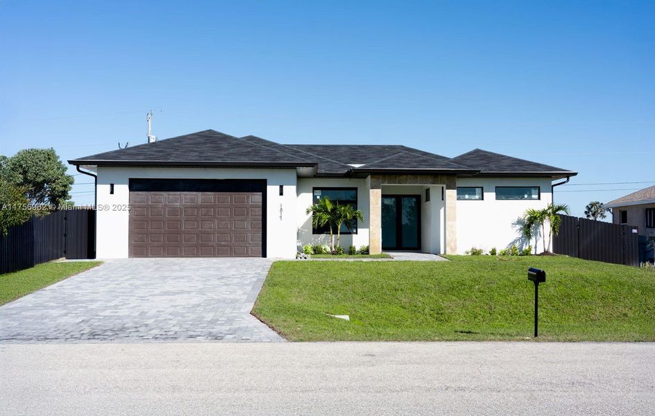 Front exterior of a new home in , Cape Coral, FL, highlighting curb appeal (Image 17).