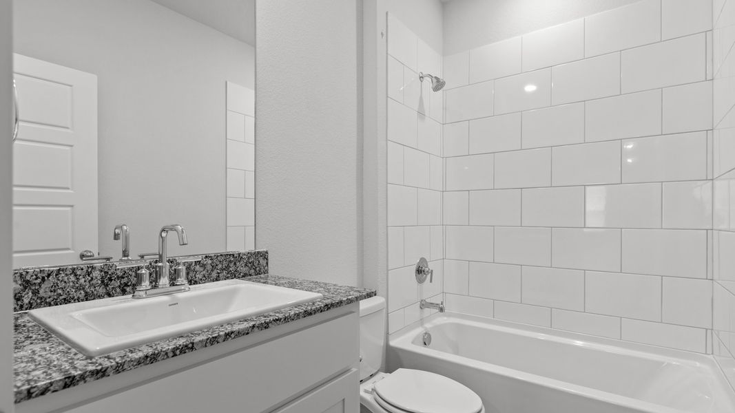 Representative furnished interior of a home built from the LAKE FORT by D.R. Horton in Heritage Parks, Abilene (Image 13).